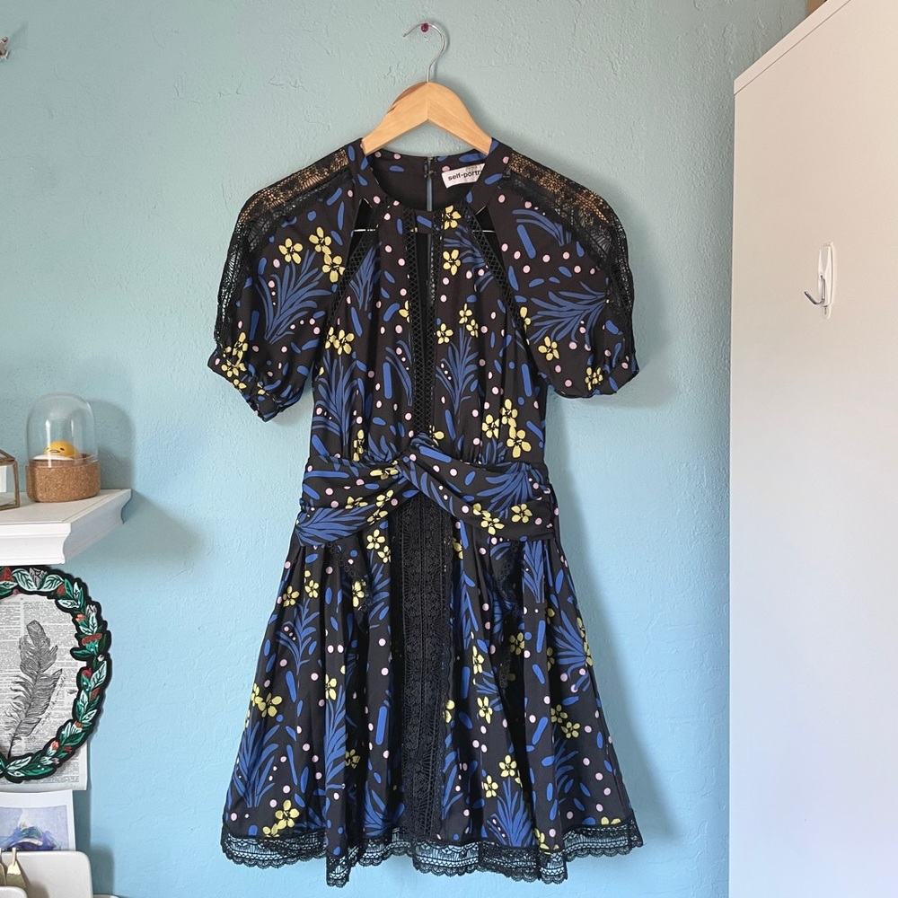 self portrait wildflower mini dress. floral pattern with cutouts chest ruffles